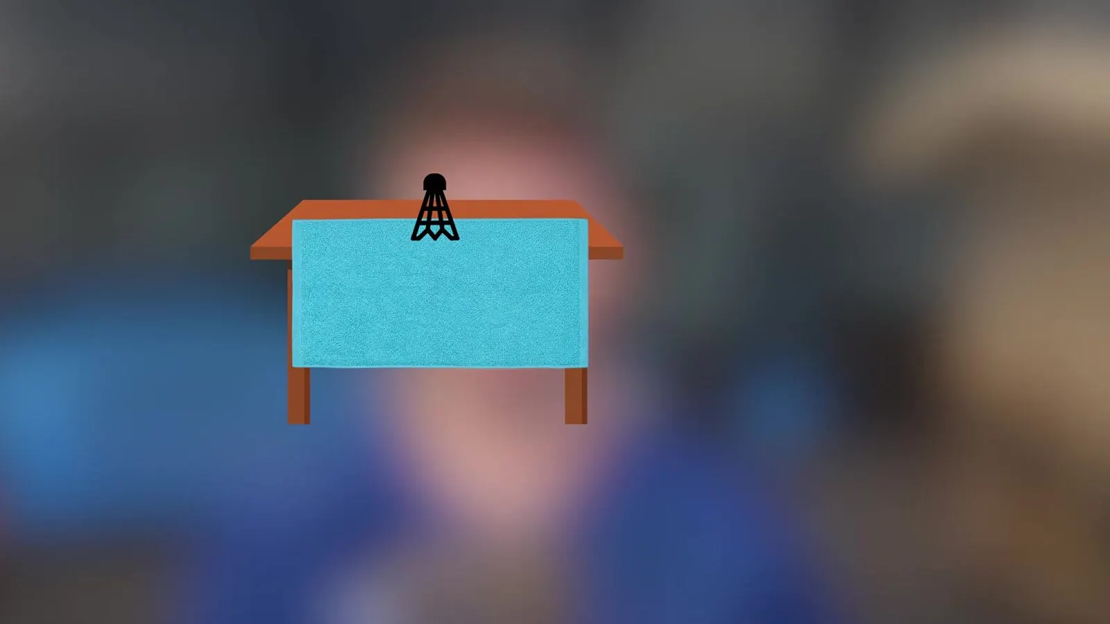 Schéma d'un volant posé debout au bord d'une table couverte d'une serviette qui joue le rôle du filet